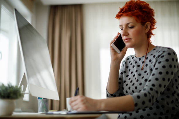 istock regnant woman working from home office 941809162