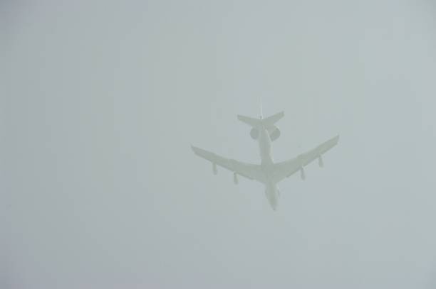 istock Airplane in fog 941812378