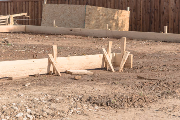 istock Wooden formwork concrete strip foundation for a new house 941815020