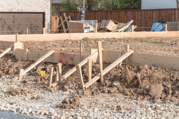 istock Wooden formwork concrete strip foundation for a new house 941821330