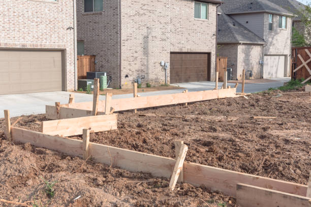 istock Wooden formwork concrete strip foundation for a new house 941821950