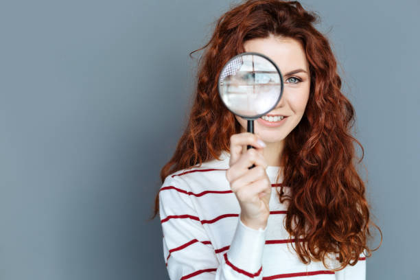 istock Close up of magnifying glass 941826754