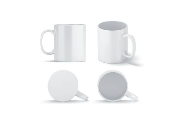 istock Blank white glass mug mock ups set isolated 941830440