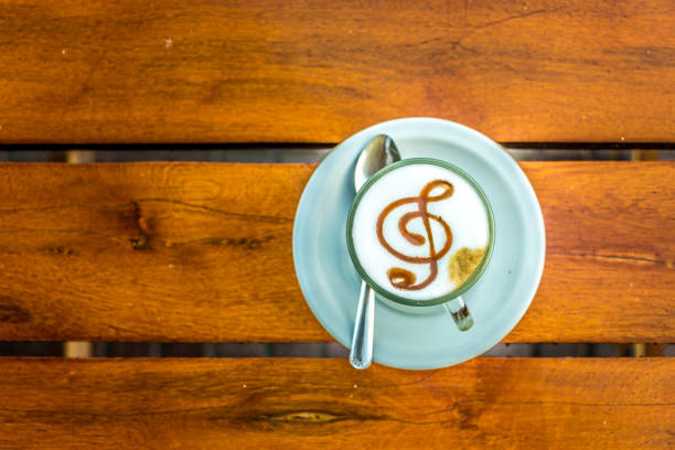 Coffee with the treble clef G on top. stock photo