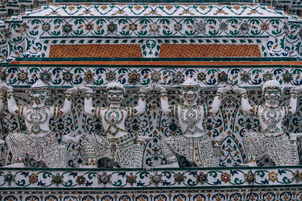 istock Wat Arun Statues Holding Up The Temple 941834530