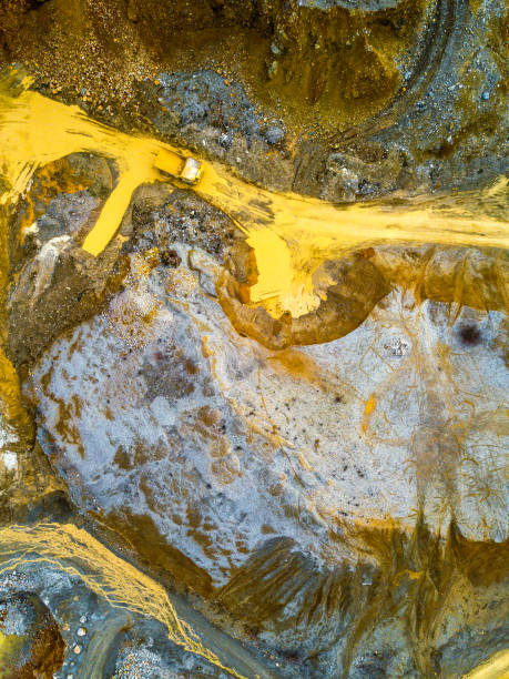 istock Aerial View of a Quarry With Vehicles 941835102