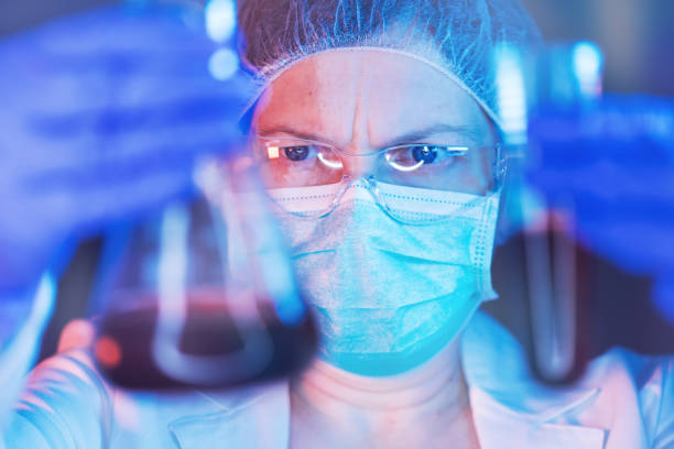 istock Scientist working with chemicals in laboratory 941842272
