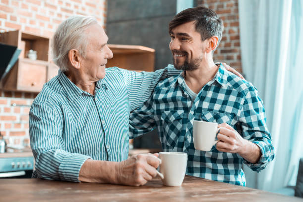 istock Positive happy father and son spending time together 941844030