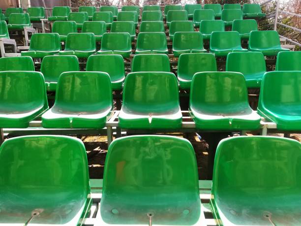 istock Green sport stadium seats 941851286