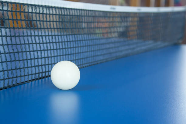 istock white ball for table tennis lies on a blue table 941851778