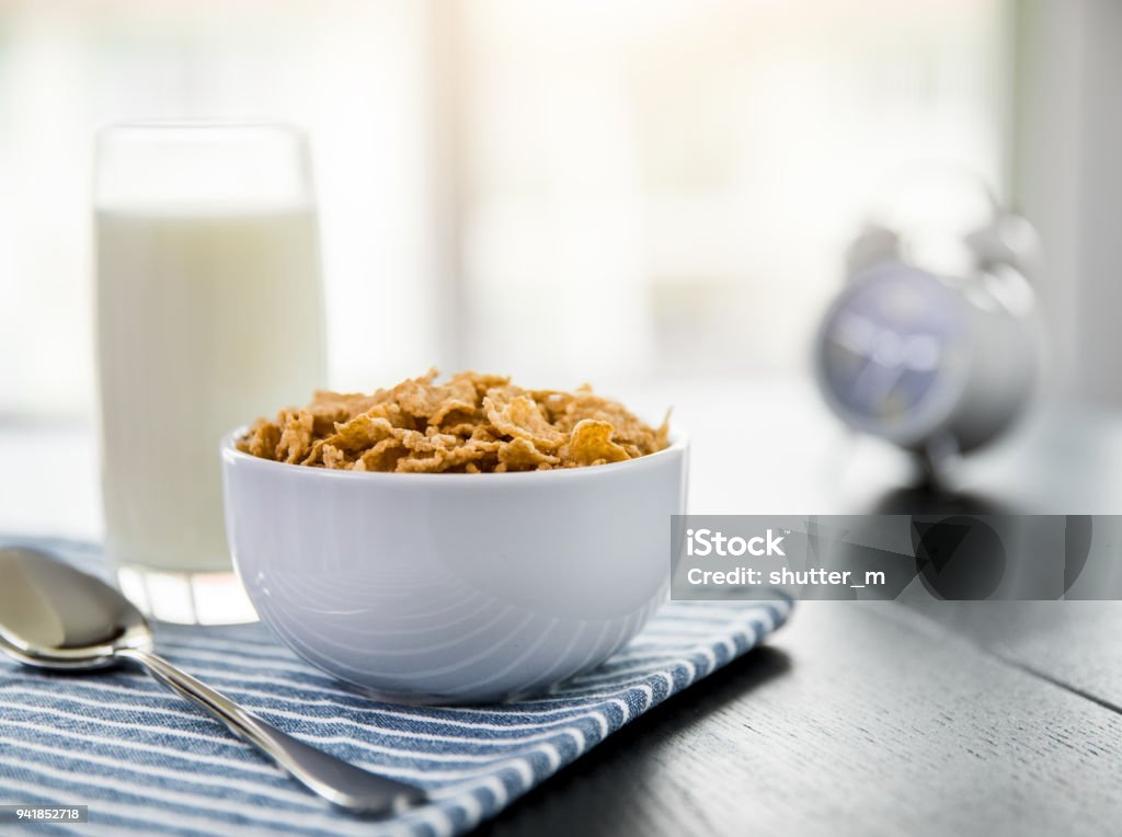 Healthy Corn Flakes with milk for Breakfast on table, food and drink Breakfast Cereal Stock Photo