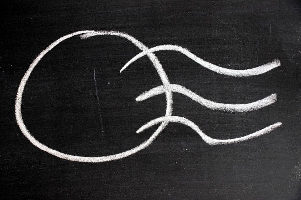 istock White chalk drawing in postmark shape on black board background 941862208