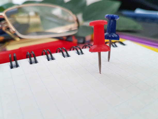 istock pushpin notepad office, glasses, keys, plant 941863312