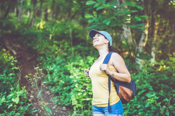 istock Girl trekking through mountain 941867662