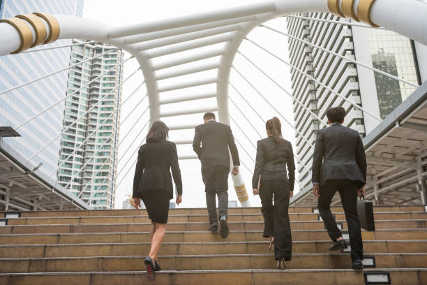 istock Business team walking in city 941870358
