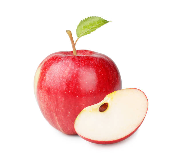istock Ripe red apple with leaf and slice isolated on white background 941883168