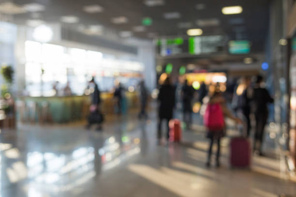 istock Blurred people in airport. 941909092