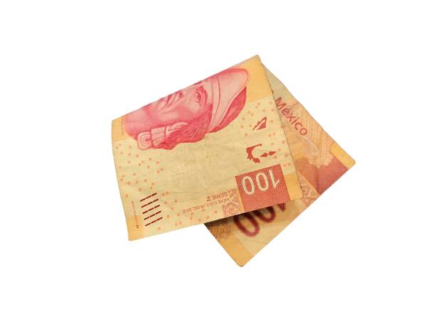 istock One single folded mexican peso 100 bill isolated on white background 941913178