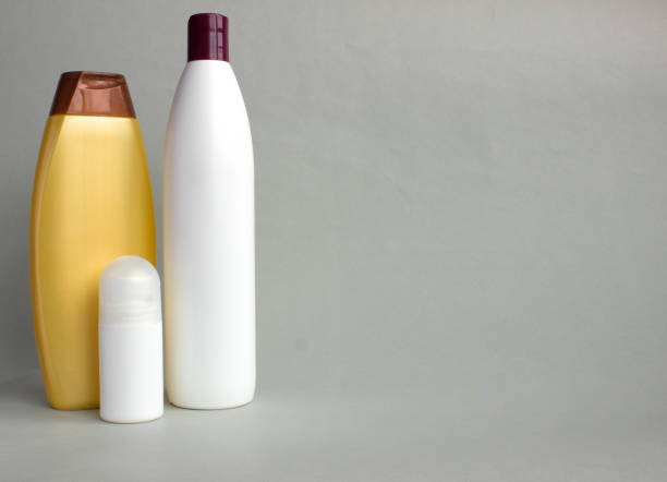 istock Body care products on gray background 941915940