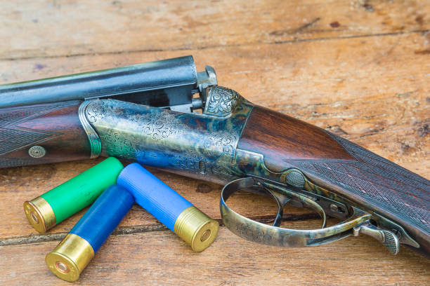 istock Beautiful hunting rifle and three sleeves 941925122