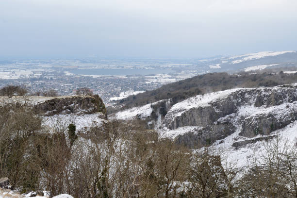 Cheddar gorge in Somerset View from the top of Cheddar gorge on a snowy day cheddar gorge stock pictures, royalty-free photos & images