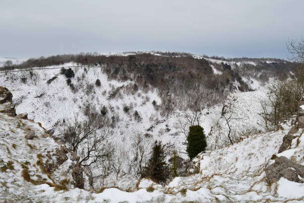 Cheddar gorge in Somerset View from the top of Cheddar gorge on a snowy day cheddar gorge stock pictures, royalty-free photos & images