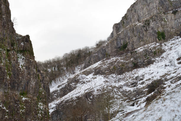 Cheddar gorge in Somerset Scenic view inside Cheddar gorge on a snowy day cheddar gorge stock pictures, royalty-free photos & images