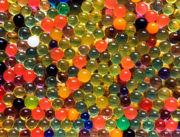 istock Bright gel balls, abstract multicolored background. 941935042