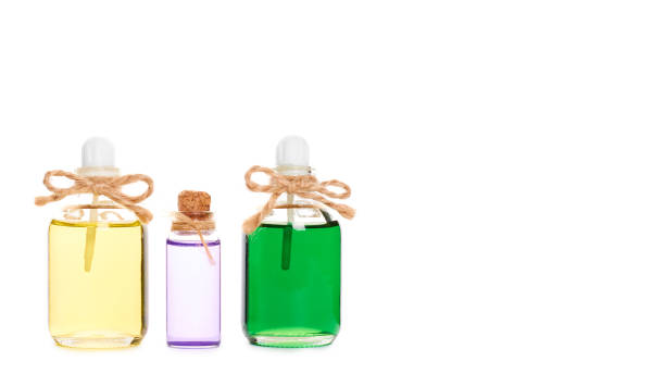 istock eco aroma oil bottle isolated on white background. copy space, template 941936284