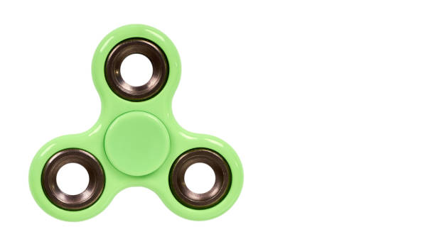 istock green fidget spinner isolated on white background. copy space, template 941938624