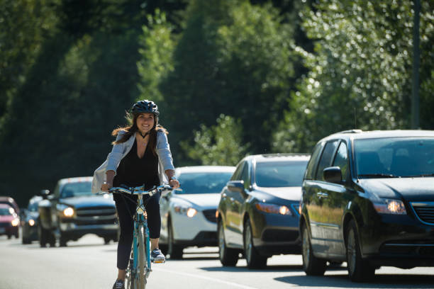 istock Woman commuting in a cycling lane 941940888