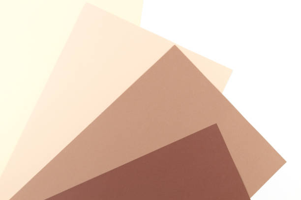 istock Colorful soft brown, beige, yellow and white paper background. 941946822