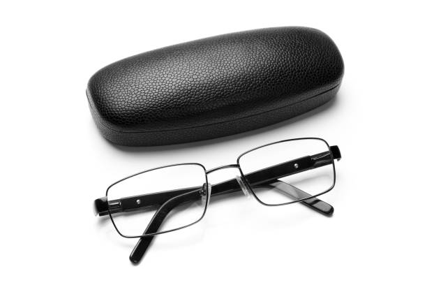istock Black leatherette eyeglass case and eyeglasses in fine metal frame 941947440