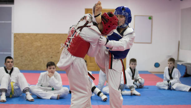 istock Kids on taekwondo training in gym 941954804