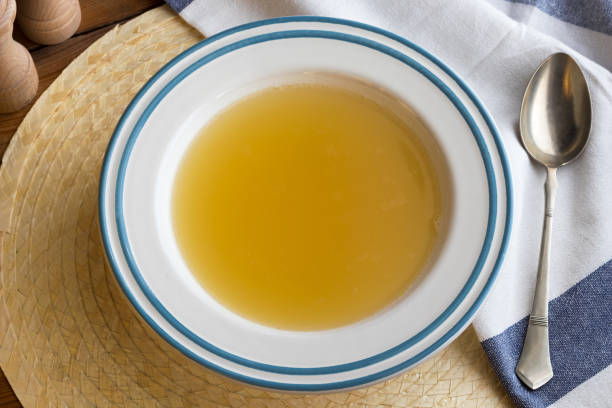 istock Chicken bone broth served in a soup plate 941955124