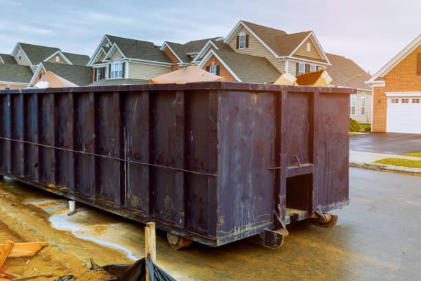 istock garbage containers near the new home, Red containers, recycling and waste construction site on the background 941957730