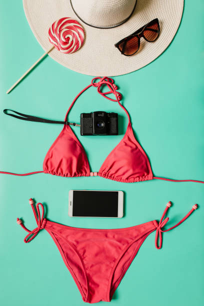 istock Summer vacation concept with pink bikini suit, hat and accessories 941961478