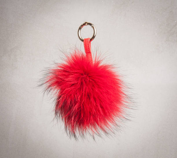 istock Red pom pom fur made pendant for cell phone 941964154