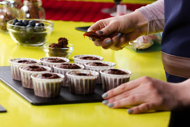 istock Close up of decorating cupcakes 941964586