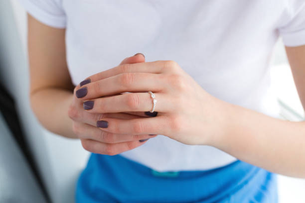 istock Woman wearing an engagement ring 941964594