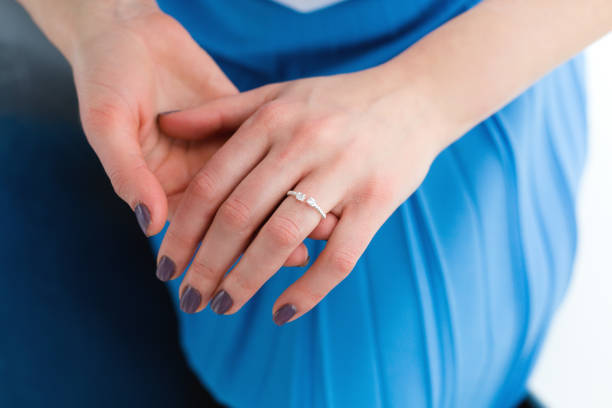 istock Woman wearing an engagement ring 941964628