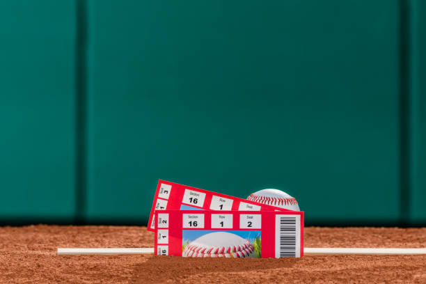 istock A pair of game ticket stubs and a baseball on pitcher's mound 941965702