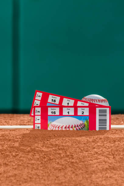 istock A pair of game ticket stubs and a baseball on pitcher's mound 941965728