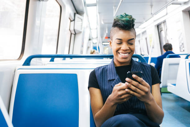 istock hip millennial businesswoman texting 941968906