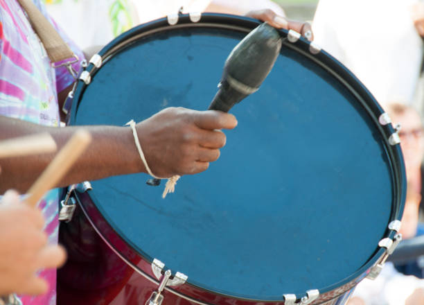 istock Hands of a traditional drummer and base drum 941969174