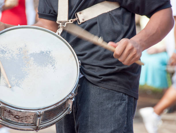 istock Hands of a traditional drummer and base drum 941969186