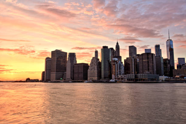 istock New York City Lower Manhattan with Brooklyn Bridge at Sunset 941973248