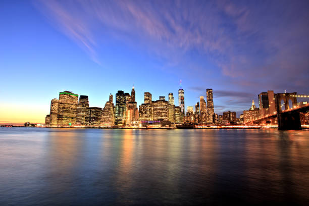 istock New York City Lower Manhattan with Brooklyn Bridge at Sunset 941973250
