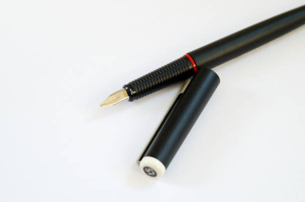 istock Modern caligraphic fountain pen on white background 941984750