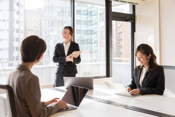 istock asian businesswomen working in office 941995466